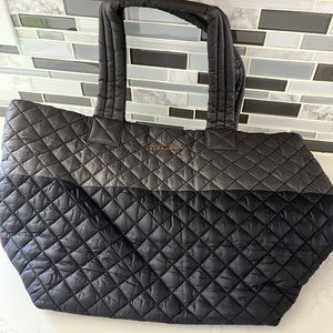 Magnet/Black Colorblock Medium Metro Tote comes with pouch inside